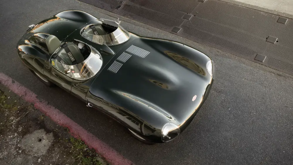 1955 Jaguar D-Type above