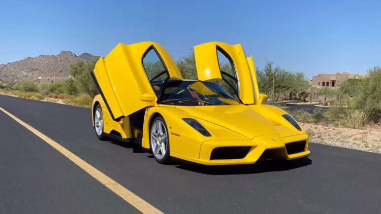 Yellow 2003 Ferrari Enzo with doors open RM Sotheby's Arizona (Scottsdale) 2021 Sale