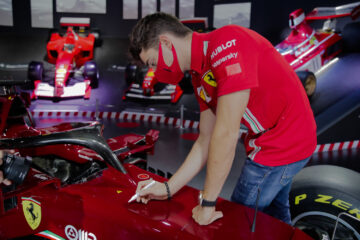 Charles Leclerc signing the Ferrari SF1000 Show Car