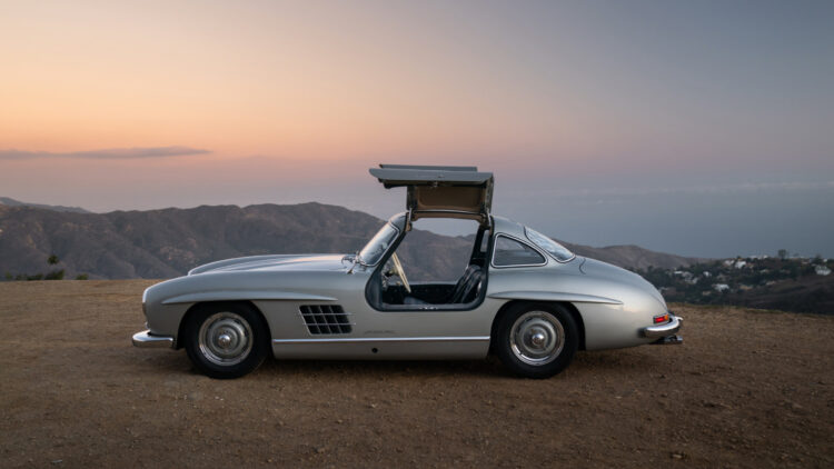 Most expensive cars sold at public auction in January 2022 - Profile open doors 1955 Mercedes-Benz 300 SL Alloy Gullwing on sale at RM Sotheby's Arizona Scottsdale 2022 classic car auction
