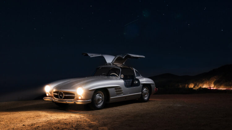 Topping the results at the RM SOtheby's Arizona Scottsdale sale with a model record 1955 Mercedes-Benz 300 SL Alloy Gullwing at night