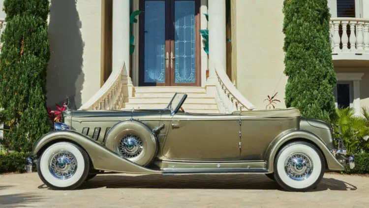 1934 Packard Twelve Individual Custom Convertible Victoria by Dietrich one of the top cars on sale at Amelia Island 2022
