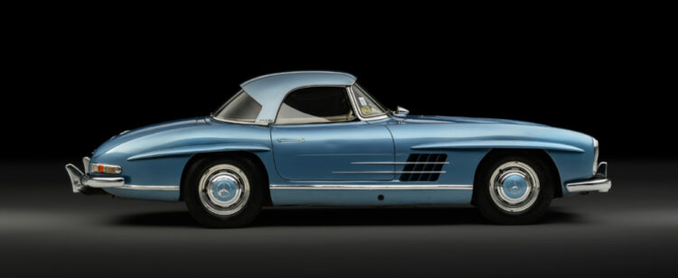 Profile of The 1958 Mercedes-Benz 300 SL Roadster of famed racing driver Juan Manuel Fangio is for sale in a sealed bid auction arranged by RM Sotheby's.