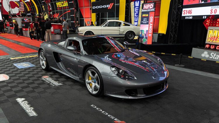 The 182-mile 2005 Porsche Carrera GT (Lot S145) sold for a model record $2,200,000.